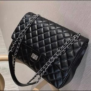 black quilted handbag